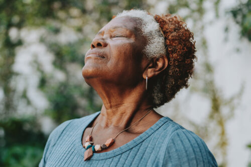 Portrait senior woman breathing